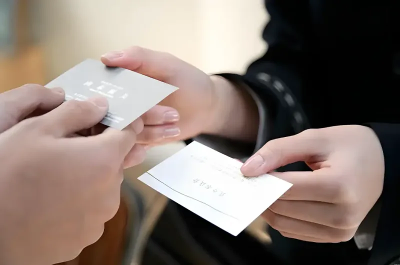 The supplier and the buyer exchange business cards