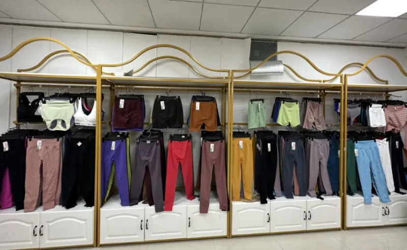 Yoga Clothing Factory Yoga Wear Sample Showroom With Multi-color Apparel Display Racks