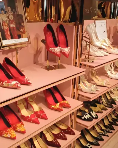 Red high heels displayed in a market shop