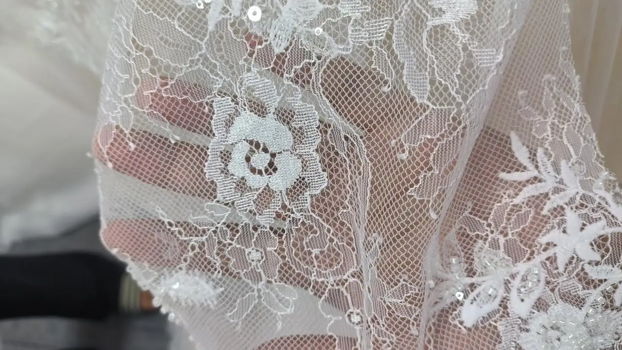Reference images of wedding dress lace craftsmanship