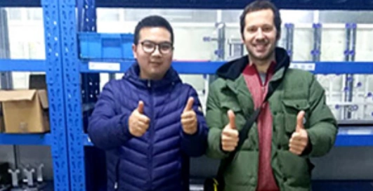 SourcingYuan’s worker with our CNC client from German