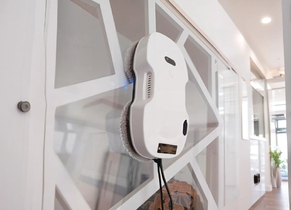 Window Cleaning Robot Working On Interior Glass Window Cleaning Robot Working On Interior Glass